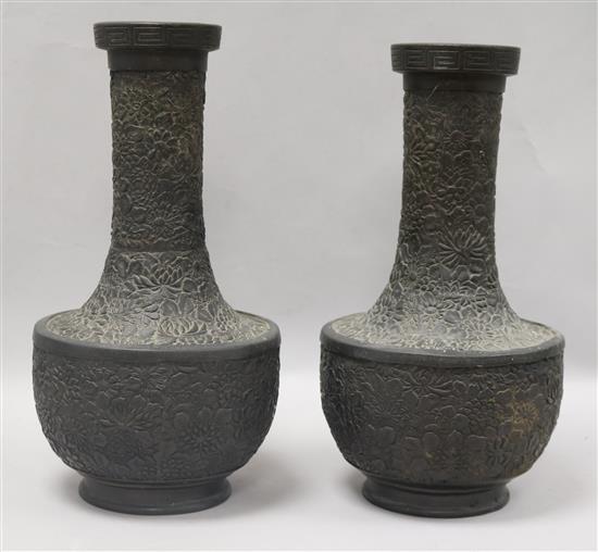 A pair of Chinese bronze thousand flower bottle vases